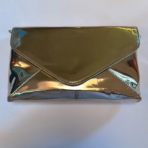 NWOT Francesca’s Gold Chrome Clutch/Crossbody Bag